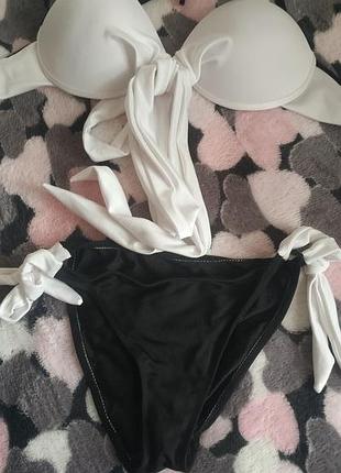 Раздельный женский купальник бело-черный р. xs-m, является дефектом