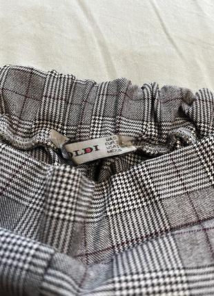 Женские брюки в клетку