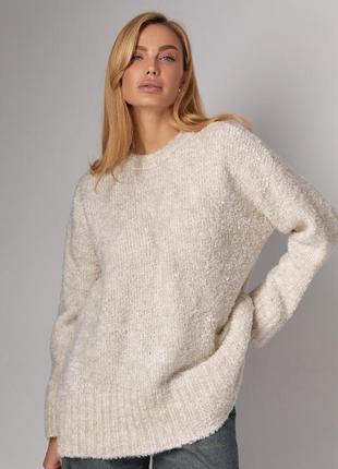 Жіночий подовжений вʼязаний джемпер oversize
