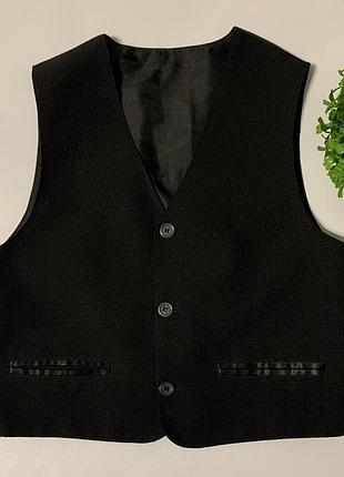 Жилетка, безрукавка костюмна
