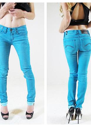 One green elephant. 100% organic colored denim.