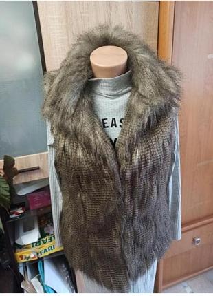 Жилетка