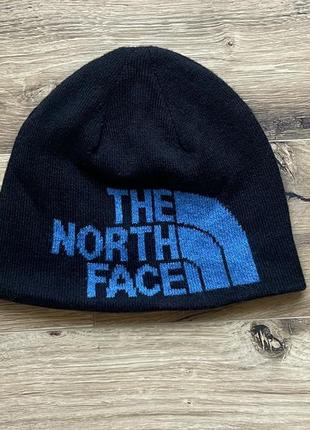 the north face чорна шапка двусторонняя
