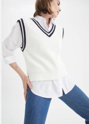 Женская жилетка