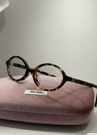 Сонцезахісні окуляри miu miu