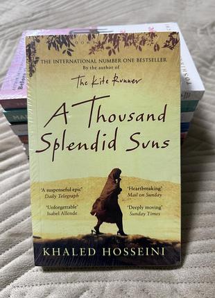 Книга a thousand splendid suns англійською мовою, мʼяка обкладинка