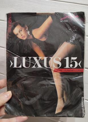 Тонкие сияющие колготки в 2-х размерах