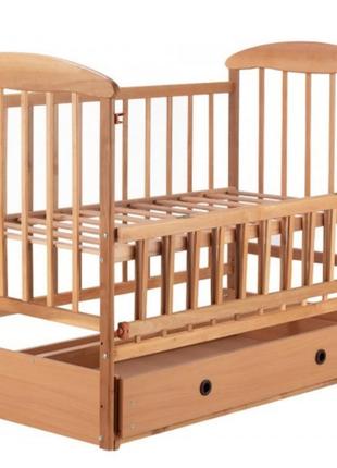 Детская кроватка с маятником