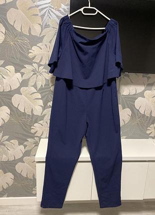 Ефектний темно синій комбінезон з відкритими плечами у великому розмірі