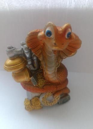 Символ року скарбничка змія