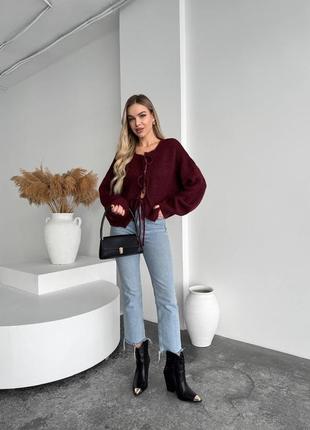 Вязаный укороченный кардиган на завязках с объемными рукавами