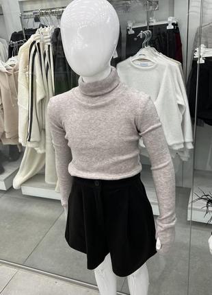 Гольф в рубчик бежевий