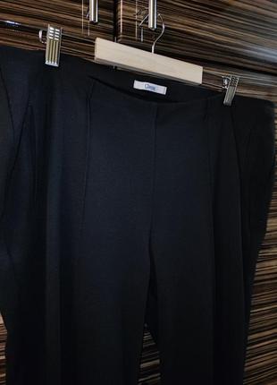 Черные брюки трикотажные