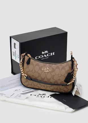 Женская бежевая сумка из натуральной кожи coach