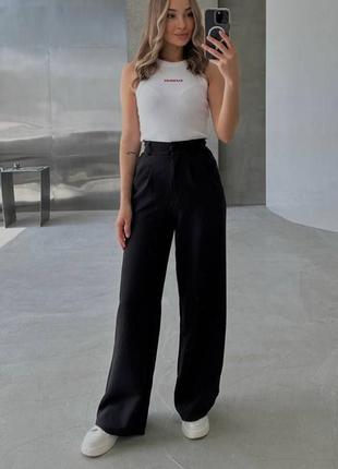 Брюки палаццо жіночі однотонні на високій посадці вільного крою з кишенями якісні стильні чорні білі