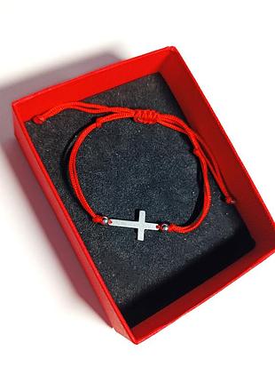 Браслет красная нить с крестом ( медсталь ). оберегает на руку