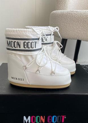 Мунбути жіночі moonboot білі чорні бежеві жіноче взуття зимове