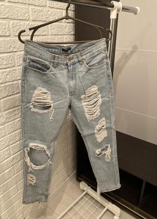 Рваные голубые джинсы brandy melville рваные джинсы zara