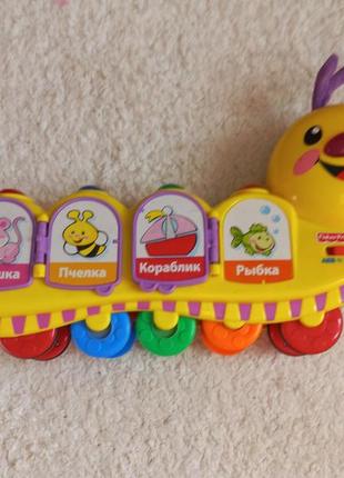 Игрушка каталка
