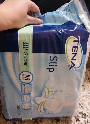 Подгузники tena slip 18 шт 7 капель