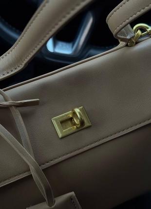 Сумка бежевая кожаная2 фото