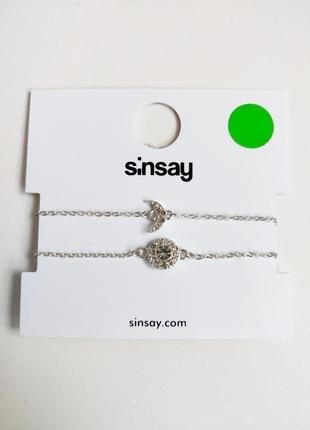 Комплект серебристых браслетов sinsay