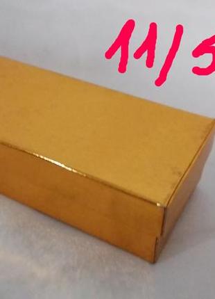 Коробка подарочная, картонная, золотого цвета размером 11/5/3 см.2 фото