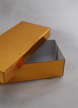 Коробка подарочная, картонная, золотого цвета размером 11/5/3 см.4 фото