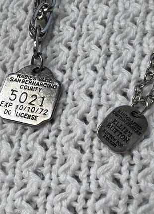 Ланцюжок з підвісками жетонами