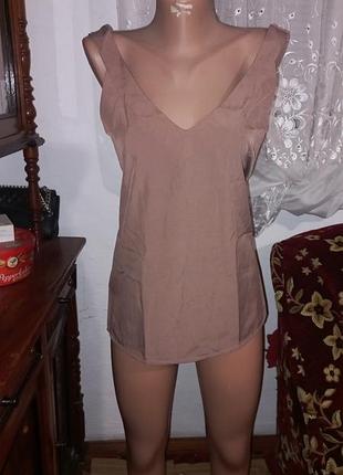 Майка. украинского производителя. размер 44. если интересует, придать замеры. новый.