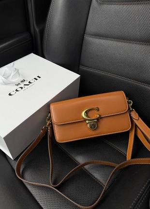 Кожаная сумка coach