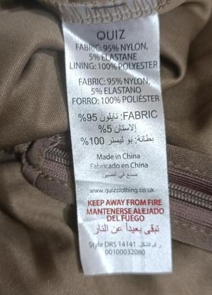 Классный сарафан бежевого цвета.