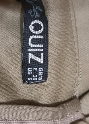 Классный сарафан бежевого цвета.