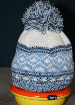 Зимняя шапочка nutmeg на 3-6мес.1 фото