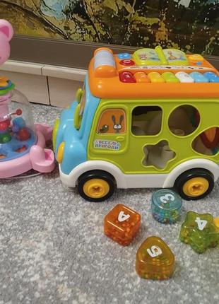 Музыкальная игрушка автобус + дзига свинка