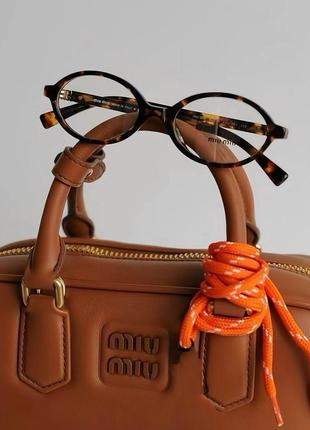 Іміджеві окуляри miu miu