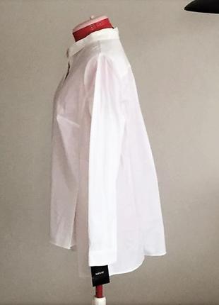 Сорочка біла асиметричної довжини з розрізами з боків usa "8" на 48-50 рр10 фото