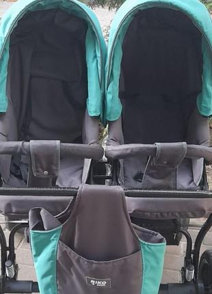 Дитяча коляска для двійнят