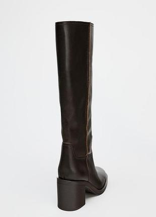 Шкіряні чоботи на широких підборах