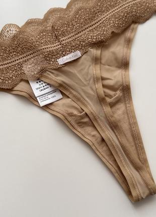 Трусики стринги calvin klein s m3 фото