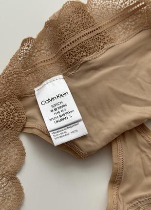 Трусики стринги calvin klein s m5 фото