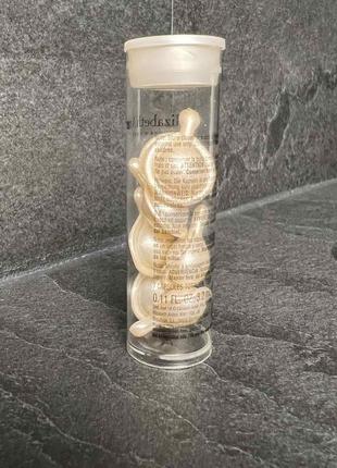 Оригінал зволожувальна сироватка з гіалуроновою кислотою elizabeth arden hyaluronic acid ceramide capsules hydra-plumping serum2 фото