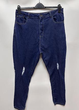 Джинси із потертостями