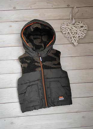 Жилетка, безрукавка