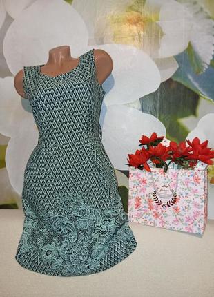 Красивое платье с карманами от бренда dejavu