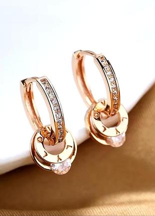 Сережки конго розове золото.