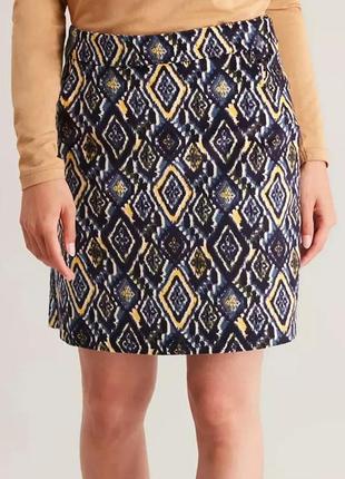 Брендовая юбка "tu" из микровельвета с геометрическим принтом. размер uk14.