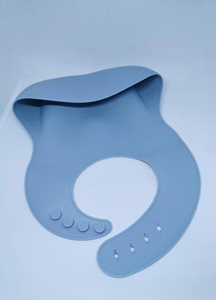 Силиконовый слюнявчик нагрудник для малыша с карманом голубой5 фото