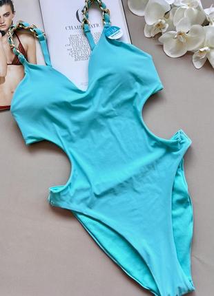 Суцільний купальник лазурового кольору censored