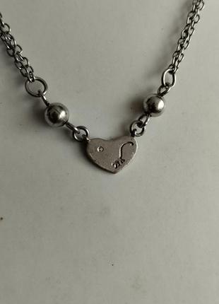 Kipring серебряное колье сердечко с крошкой бриллиантом